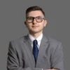 Professional man in a suit and glasses.