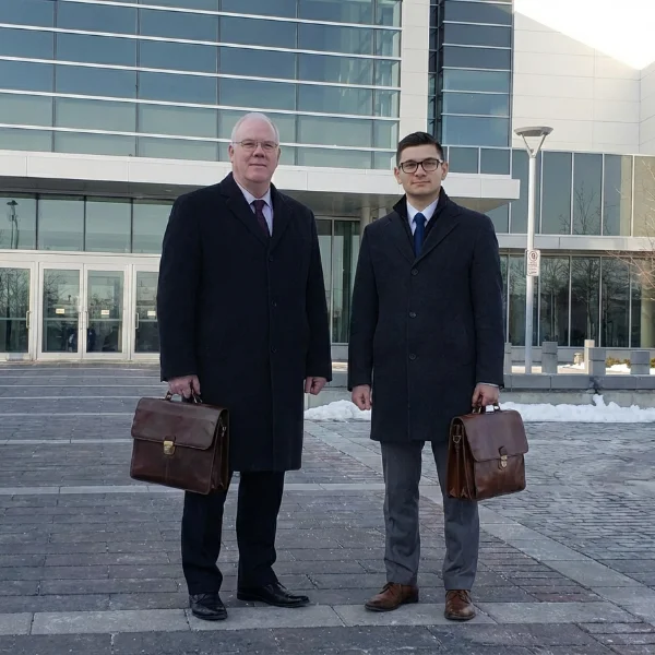 paralegals-oshawa-courthouse photo of 2 paralegals outside of the small claims court in Oshawa